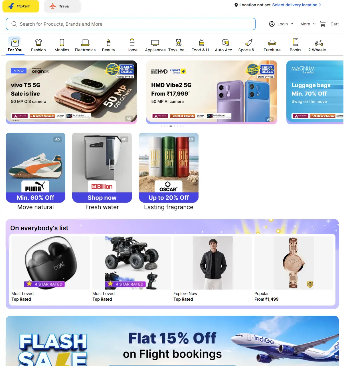 Flipkart homepage during the Big Billion Days 2026 festive shopping campaign, showing promotional banners for Vivo T5 5G and HMD Vibe2 5G smartphones, luggage discounts, Puma footwear, home appliances, fragrances, popular products, and an IndiGo flight booking offer. The page also displays Flipkart’s product categories, including fashion, mobiles, electronics, beauty, home, appliances, toys, food, automotive, sports, furniture, books, and two-wheelers. Flipkart announced that Big Billion Days 2026 early access begins 8 October 2026.