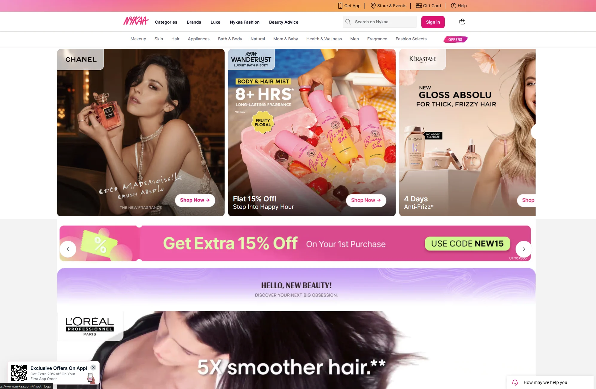 Nykaa beauty ecommerce homepage showcasing multiple promotional campaigns for fragrances, haircare, skincare, body care, and personal care products. The page features visually rich advertisements from brands including Chanel, Nykaa Wanderlust, Kérastase, and L’Oréal Professionnel, along with product benefits, discount messaging, Shop Now calls-to-action, and a 15% first-purchase promotional offer. The homepage uses large lifestyle imagery, brand-focused campaigns, product categories, promotional codes, and limited-time offers to capture customer attention and encourage online purchases. The screenshot demonstrates how a beauty ecommerce platform combines visual merchandising, promotional offers, brand campaigns, product recommendations, and conversion-focused messaging as part of its digital marketing strategy.